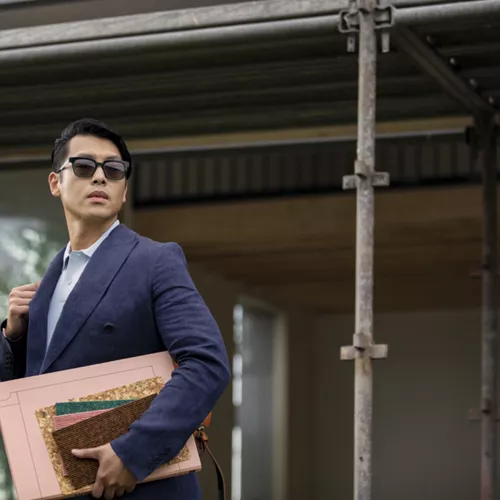 Business man wearing his Sensity lenses
