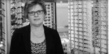 Female Hoya Vision optician working in an optician practice