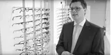 Male Hoya Vision optician in an opticians practice