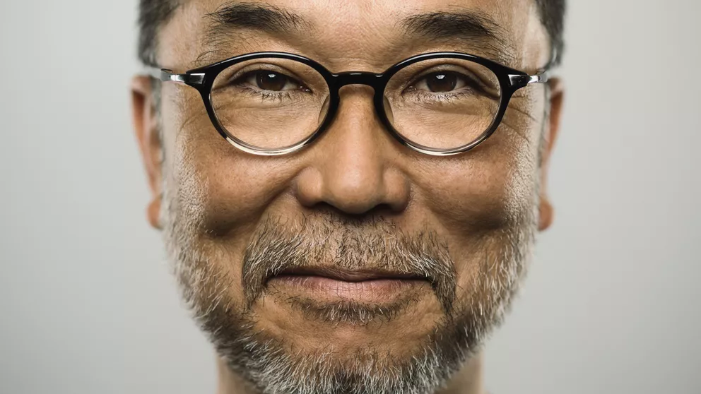 Older Asian man with glasses