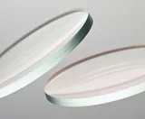 Image of two lenses on a grey background