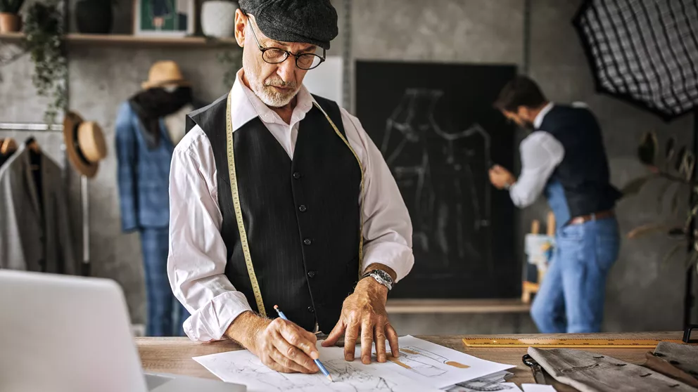 Fashion designer working with occupational lenses