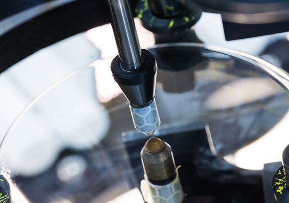 Machine holding Hoya Vision lens