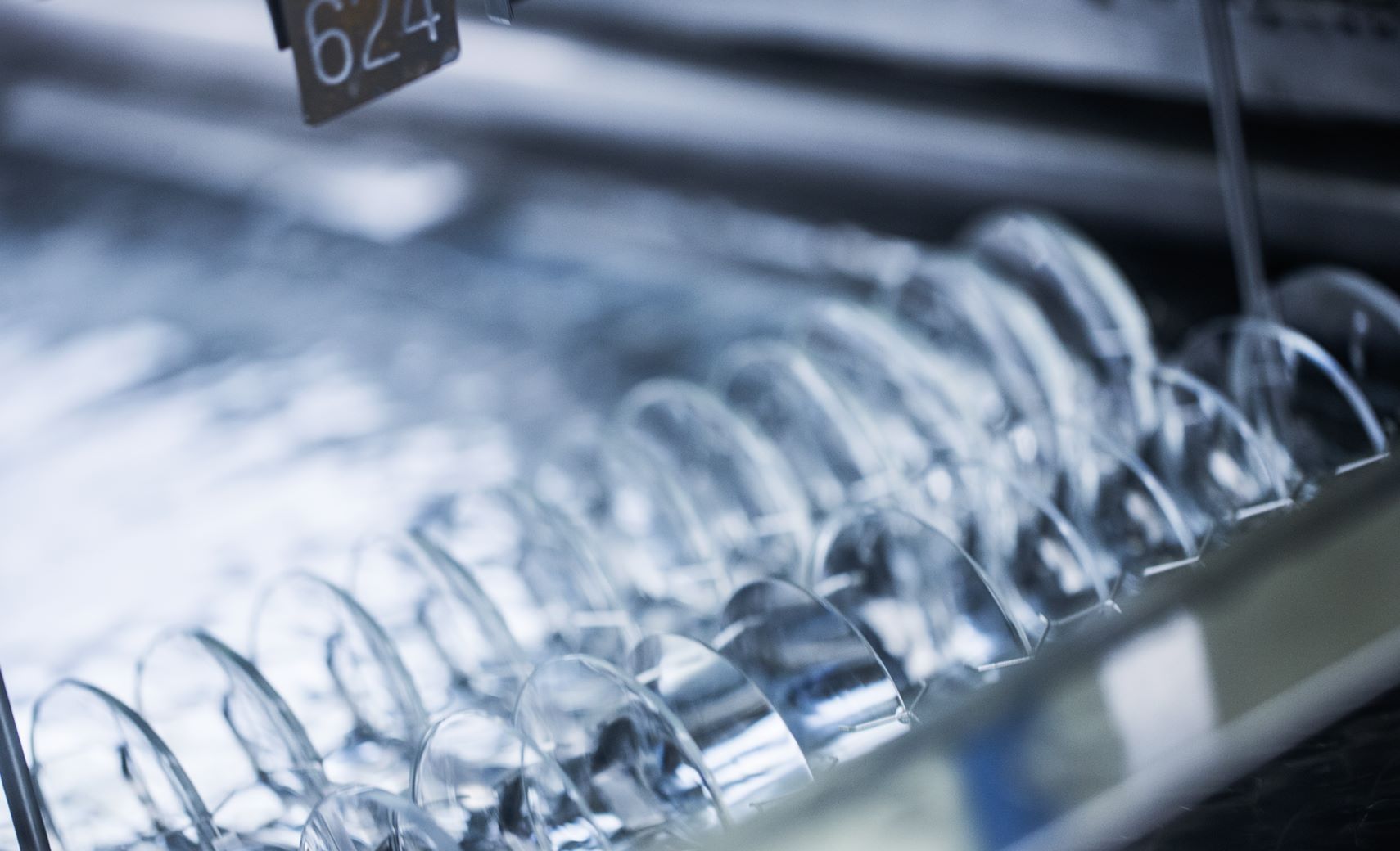 Rows of Hoya Vision eyeglass lenses 