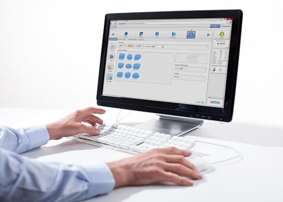 Male hands using a computer mouse and keyboard