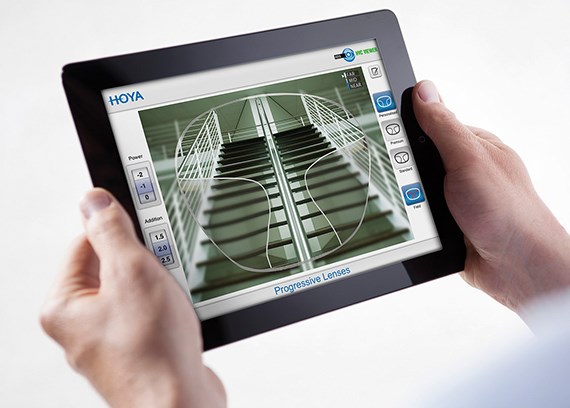 Hands holding an iPad looking at the Hoya Vision HVC viewer
