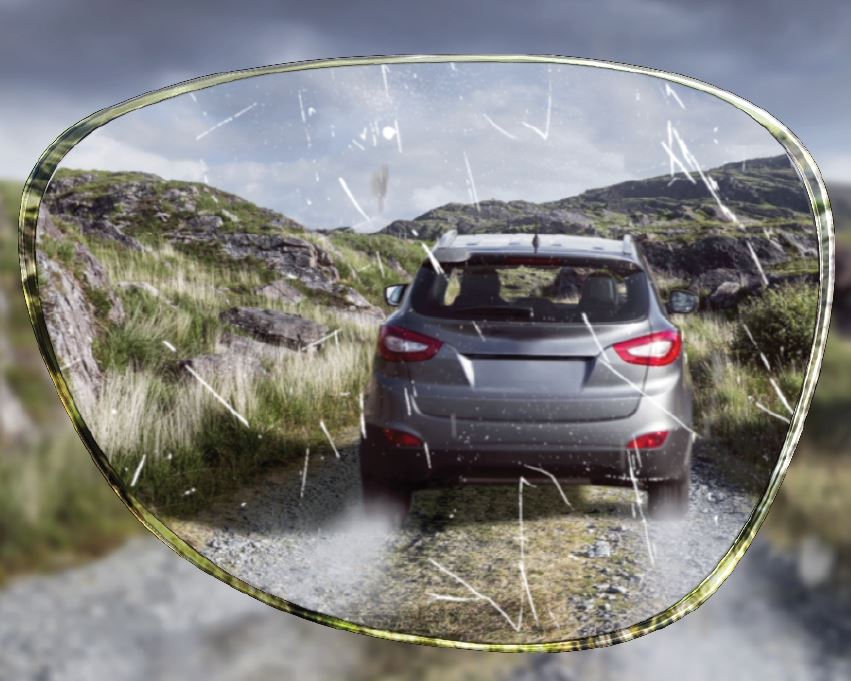 View of jeep on country track through standard scratch lens