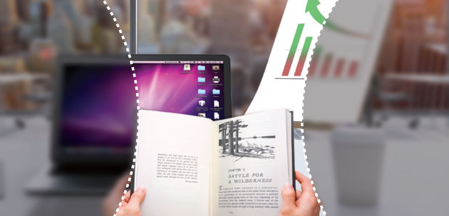 View of desk with book, laptop and coffee cup on desk