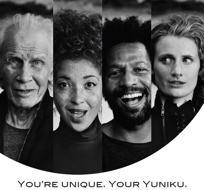 Black and white shot of four different people in circle with text along bottom