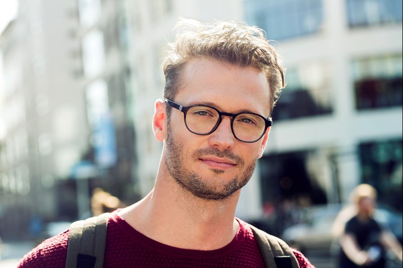 Male wearing eye glasses in city